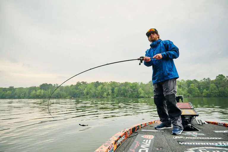 Fletcher Shryock Pro Angler wearing the blue Aspect Jacket